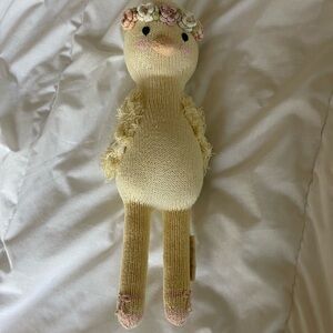 Adorable Knitted Plush Toy with Floral Accents